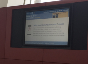A sign at an unnamed airport warns UAL passengers about the Samsung Galaxy Note 7